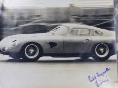 AN INTERESTING PHOTOGRAPH OF 1963 ASTON MARTIN RACE CAR TESTING AT SILVERSTONE, INSCRIBED VERSO
