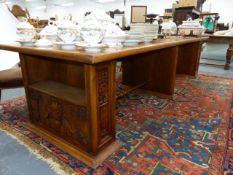 AN UNUSUAL ART DECO WALNUT LIBRARY TABLE WITH PARQUETRY INLAID TOP ON BLOCK END SUPPORTS, EACH