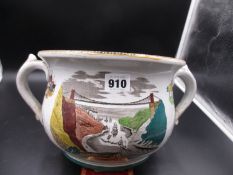 A TWO HANDLED CHAMBER POT WITH A HAND COLOURED PRINT OF CLIFTON SUSPENSION BRIDGE ON ONE SIDE, A