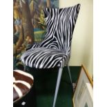 A CONTEMPORARY SIDE CHAIR BY CATELAN ITALIA WITH FAUX ZEBRA STRIPE UPHOLSTERY, ANOTHER MODERN
