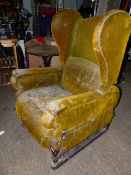 A VICTORIAN FOOTS PATENT ADJUSTABLE RECLINING WING BACK ARMCHAIR.