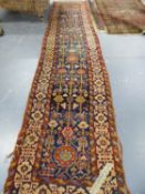 AN ANTIQUE PERSIAN HAMMADAN RUNNER. 436 x 93cms.