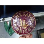 A VINTAGE CIRCULAR BRONZE NAME PLATE, MECATOR TERRIERS, CENTERED WITH A RELIEF OF A FIELD MOUSE.