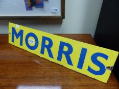 A SMALL YELLOW AND BLUE ENAMEL MORRIS SIGN. 56 x 13cms. TOGETHER WITH A LYON'S TEA GLASS SIGN, LATER