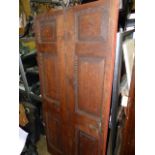 AN 18th.C.PINE PANELLED DOOR. 198 x 90cms.