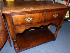 A SMALL BESPOKE GEORGIAN STYLE OAK POTBOARD SIDE TABLE WITH TWO DRAWERS. 91 x 45 x H.76cms.