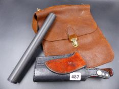 AN AIR RIFLE SILENCER, A LEATHER BELT HOLSTER AND A SMALL LEATHER BAG.