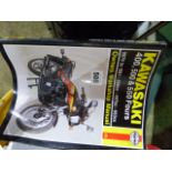 A QTY OF MOTORCYCLE WORKSHOP MANUALS.