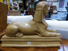 A PAIR OF CLASSICAL STYLE COMPOSITION FIGURES OF RECUMBENT SPHINX. L.63 x H.45cms.