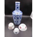 A CHINESE BLUE AND WHITE VASE, SEAL MARK UNDERFOOT, H.31.5cms, A FAMILLE ROSE TEA BOWL PAINTED