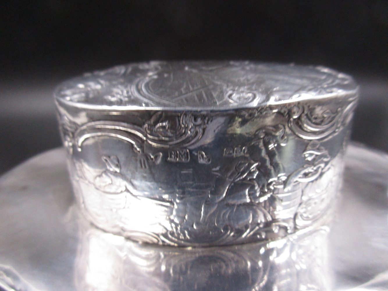 A VICTORIAN SILVER TEA CADDY WITH EMBOSSED SCENES DEPICTING 19th C. RURAL LIFE, DATED 1898 CHESTER - Image 2 of 3