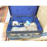 A LATE VICTORIAN BLACK LEATHER DRESSING CASE TOGETHER WITH TWO VICTORIAN CASED CARVING SETS AND