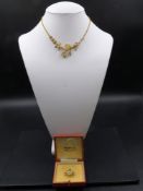 A 15ct STAMPED SEED PEARL FLORAL NECKLACE TOGETHER WITH A 9ct HALLMARKED SEED PEARL PENDANT. THE