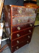 A 19th.C. MAHOGANY SMALL CHEST OF SIX LONG DRAWERS WITH BRASS KNOB HANDLES STANDING ON SHORT