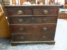 AN 18th.C.OAK CHEST OF TWO SHORT AND THREE LONG DRAWERS WITH PANELLED SIDES AND RAISED ON BRACKET