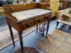 AN EARLY VICTORIAN MAHOGANY WASHSTAND WITH HIGH GALLERY BACK, TWO DRAWERS AND TURNED LEGS.