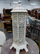 A VINTAGE WHITE PAINTED CAST IRON GOTHIC REVIVAL STYLE CONSERVATORY HEATER NOW MOUNTED AS A LAMP