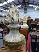 A PAIR OF WEATHERED POTTERY GARDEN / GATE FLAME FORM FINIALS. H.78cms.