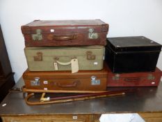 VARIOUS VINTAGE LEATHER AND OTHER SUITCASES TOGETHER WITH A TIN DEED BOX AND FIVE WALKING STICKS.
