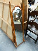 A SMALL WALNUT FRAMED CHEVAL MIRROR, A LIMED OAK STANDARD LAMP AND A DRAWING BOARD. (3)