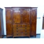 A VICTORIAN MAHOGANY LINEN PRESS COMPACTUM WARDROBE WITH FITTED SLIDES OVER TWO SHORT AND THREE LONG