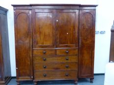 A VICTORIAN MAHOGANY LINEN PRESS COMPACTUM WARDROBE WITH FITTED SLIDES OVER TWO SHORT AND THREE LONG