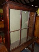 AN EARLY 19th.C.MAHOGANY DISPLAY BOOKCASE WITH SINGLE DOOR. 100 x 28 x H.102cms.