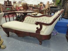 A 19th.C.NORTH EUROPEAN CHAISE LONGUE WITH MAHOGANY SHOW FRAME AND BUTTON UPHOLSTERY. L.210cms.