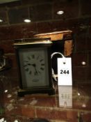 A LATE VICTORIAN CARRIAGE CLOCK, THE DIAL SIGNED WALTER & Co, 261 FINCHLEY ROAD COMPLETE WITH A