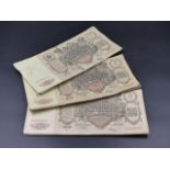 THREE CLIPS OF TEN 100 ROUBLE NOTES DATED 1910.