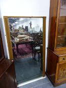 A 19th.C.TALL GILT FRAMED OVERMANTLE MIRROR, TWO PART GLASS PLATE WITH BEVEL EDGE. H.168 x W.90cms.