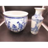 A CHINESE BLUE AND WHITE PLANTER PAINTED WITH LADIES PLAYING GO. Dia.14cms. AND A VASE WITH TWO