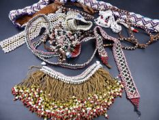 A BAG OF ZULU BEADWORK.