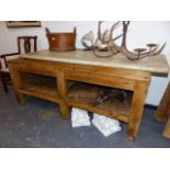 AN ANTIQUE PINE SCULLERY / KITCHEN BAKER'S TABLE WITH POTBOARD BASE AND RAISED THICK MARBLE TOP. 160