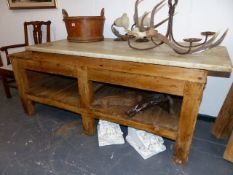 AN ANTIQUE PINE SCULLERY / KITCHEN BAKER'S TABLE WITH POTBOARD BASE AND RAISED THICK MARBLE TOP. 160