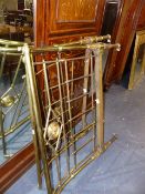 A VICTORIAN BRASS SINGLE BED WITH CERAMIC CASTORS LABELLED R.W.WINFIELD & Co. LONDON.