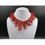 AN ANTIQUE BRANCH CORAL GRADUATED NECKLACE AND BRACELET SET, NECKLACE 41cms, BRACELET 19cms.