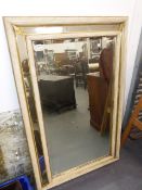 A 19th.C.MARGINAL FRAME WALL MIRROR WITH PAINTED REEDED TWO PART FRAME AND GILT ACCENTS.. 95 x