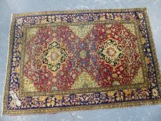 AN ANTIQUE PERSIAN ISPHAHAN RUG OF UNUSUAL DESIGN. 204 x 141cms.