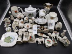 A COLLECTION OF COMMEMORATIVE MINIATURE CERAMICS PRINTED WITH TOWN CRESTS AND VIEWS.