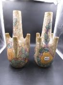 A PAIR OF UNUSUAL AMPHORA ROSE DECORATED POTTERY VASES. H.40cms.