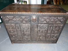 A 17th.C.AND LATER CARVED OAK BLANKET CHEST OF LATE 19th.C.CONSTRUCTION INCORPORATING EARLY 17th,