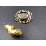 A PRECIOUS YELLOW METAL, TESTS AS GOLD, PEANUT ,MEASUREMENTS 4.5cms, WEIGHT 16.6grms. TOGETHER