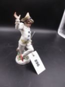 A MEISSEN FIGURE OF A PUNCHINELLO DANCING. H.16.5cms.