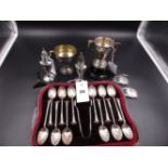 A CASED SET OF TWELVE VICTORIAN FLUTED TEA SPOONS AND A PAIR OF MATCHING SUGAR TONGS, DATED 1893 FOR