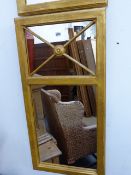 A PAIR OF MODERN REGENCY STYLE GILT FRAMED PIER MIRRORS. 50 x 101cms.