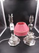 A PAIR OF SILVER HALLMARKED ELECTRIC TABLE LAMP BASES INCLUDING SHADES WITH HEXAGONAL LOADED