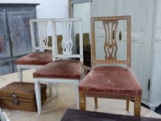 TWELVE NORTH EUROPEAN DINING CHAIRS WITH CARVED TOP RAILS, PIERCED BACKS AND OVERSTUFFED SEATS ON