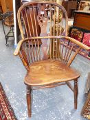 A 19th.C.COUNTRY BEECH AND ELM WINDSOR ARMCHAIR WITH TURNED LEGS AND STRETCHERS.