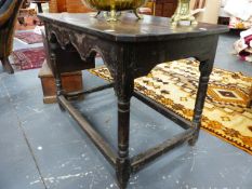 AN 18th.C.AND LATER OAK STRETCHER BASE SIDE TABLE WITH SHAPED FRIEZE AND TURNED LEGS. 90 x 58 x H.